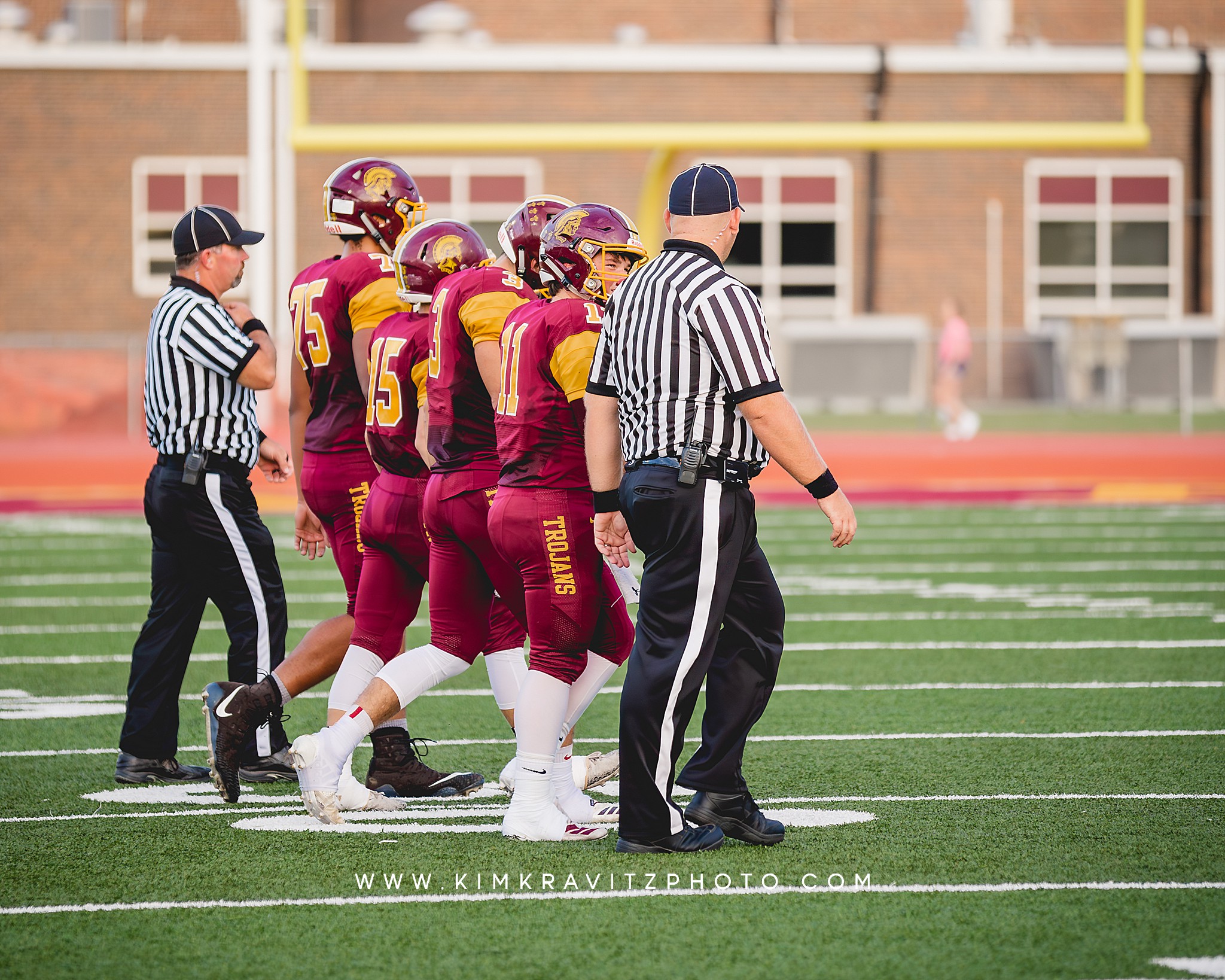 High school football kim kravitz girard trojans captains