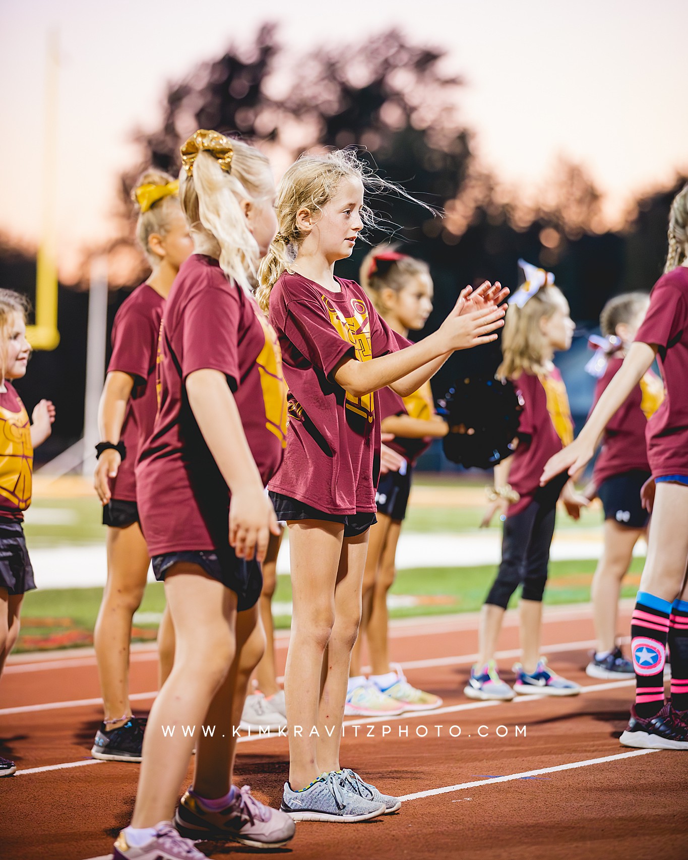 Football homecoming Kim Kravitz kansas tiny trojans cheer