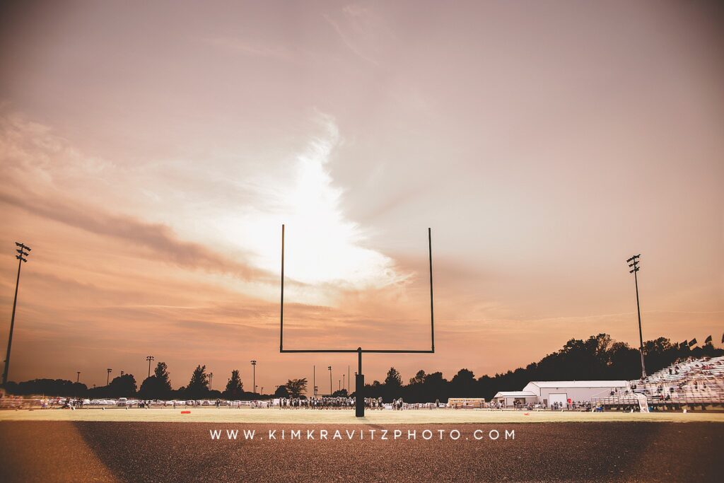 sunset at a high school football game